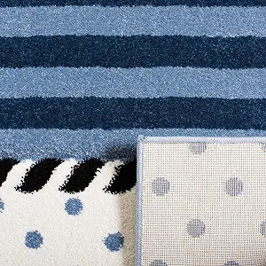 SAFAVIEH Carousel Kids Collection Accent Rug - 2'3" x 4', Navy & Ivory, Non-Shedding & Easy Care, Ideal for High Traffic Areas for Boys & Girls in Playroom, Nursery, Bedroom (CRK124N)