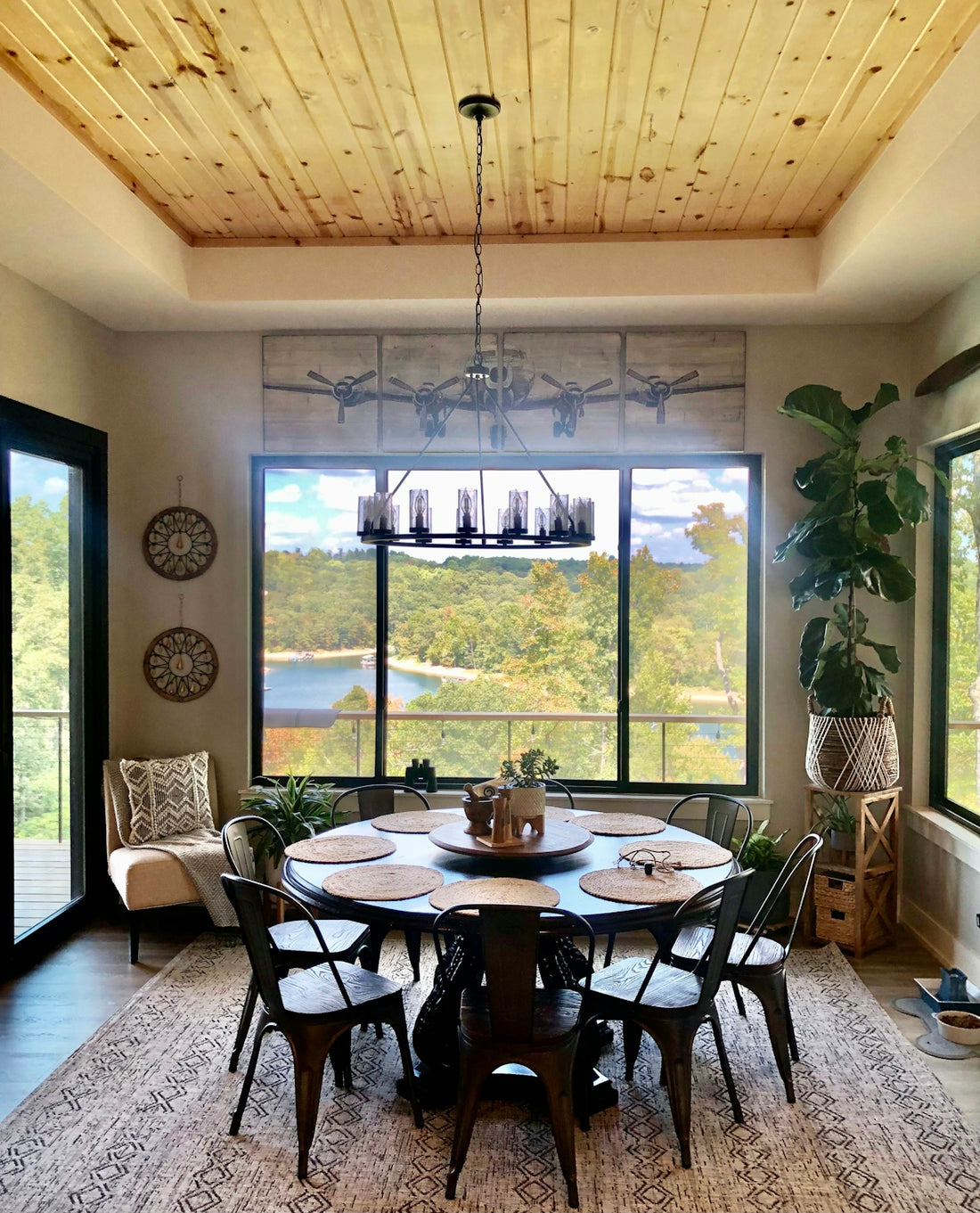 a dining room with a table and chairs