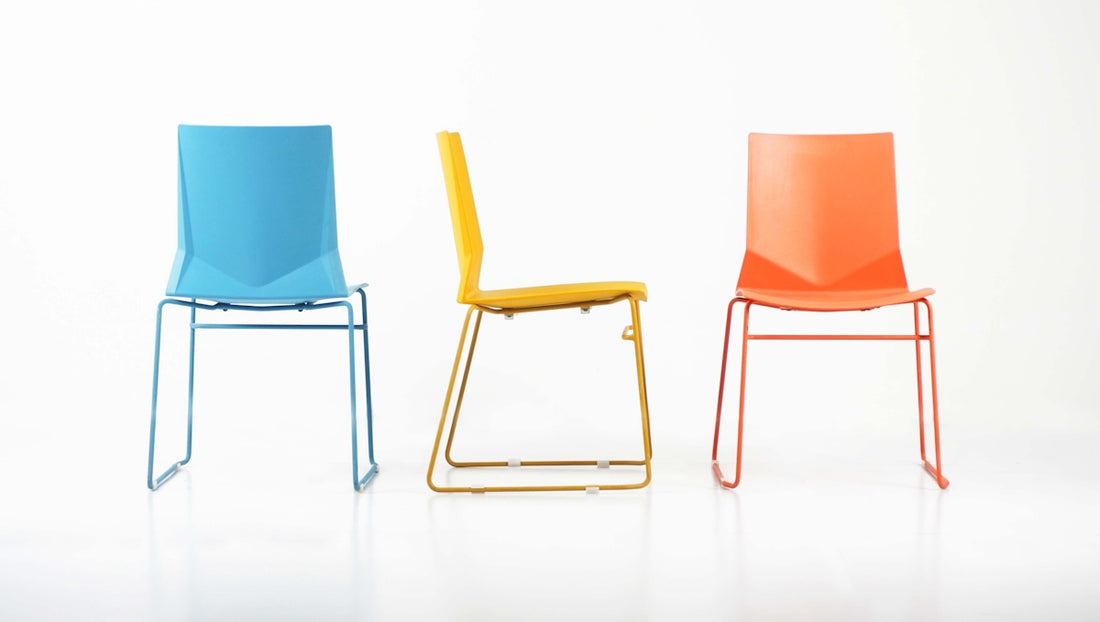 a group of three chairs sitting next to each other