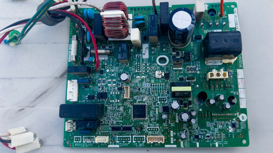 A circuit board with wires and wires attached to it
