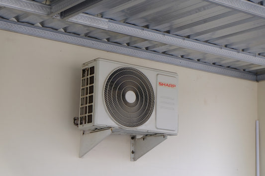 An air conditioning unit mounted on a wall.