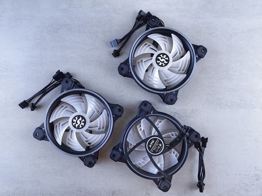 Three computer cooling fans arranged on a surface