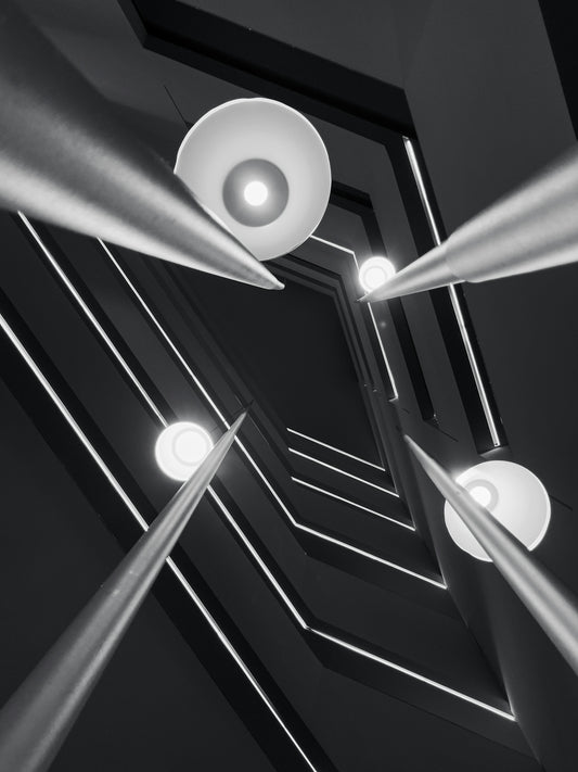Modern architecture with dramatic lighting and sharp angles.
