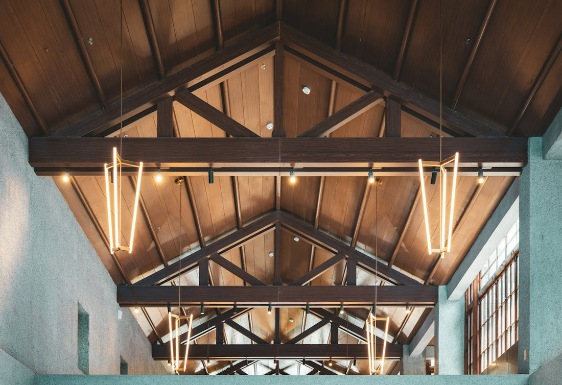 Modern interior with exposed wooden beams and lights