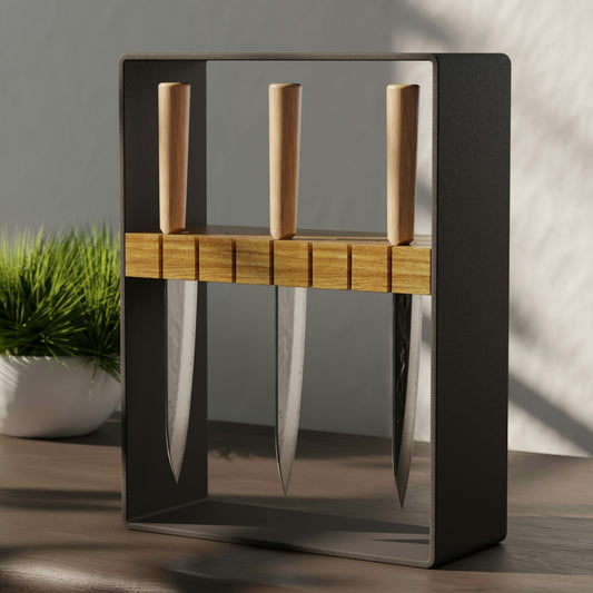 Three kitchen knives with wooden handles hanging in a dark metal frame