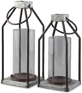Signature Design by Ashley Diedrick Rustic Lantern, Set of 2, Indoor/Outdoor, Galvanized Metal, Antiqued Finish, Glass Shade, Holds 3 in. Pillar Candles (Not Included), 19" &17", Gray and Black