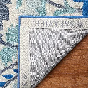 SAFAVIEH Antiquity Collection Accent Rug - 2' x 3', Ivory & Blue, Handmade Floral Wool, Ideal for High Traffic Areas in Entryway, Living Room, Bedroom (AT59B)