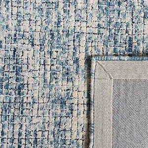 SAFAVIEH Abstract Collection Accent Rug - 2'3" x 4', Ivory & Navy, Handmade Wool, Ideal for High Traffic Areas in Entryway, Living Room, Bedroom (ABT473M)
